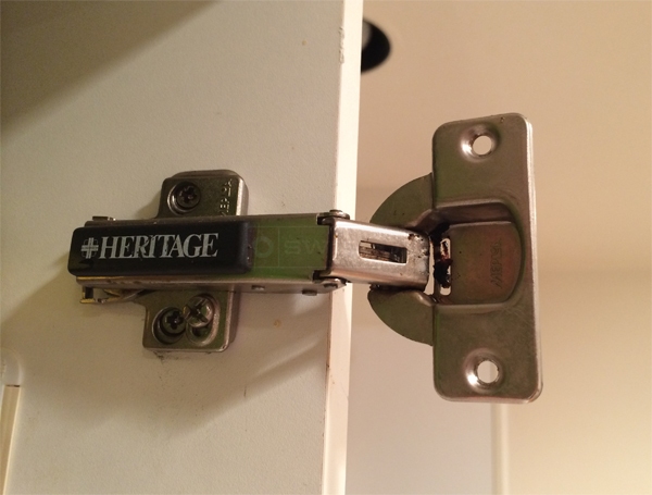 User submitted a photo of a cabinet hinge.