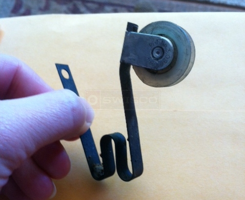 User submitted photos of a screen door roller.