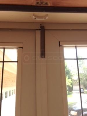 User submitted photos of storm door hardware.