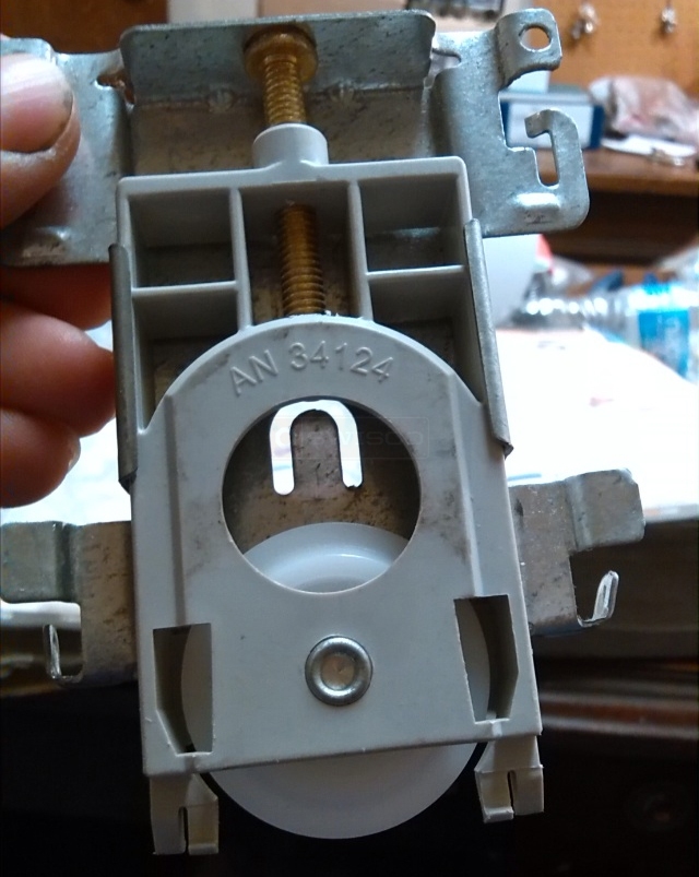 User submitted a photo of a closet door roller.
