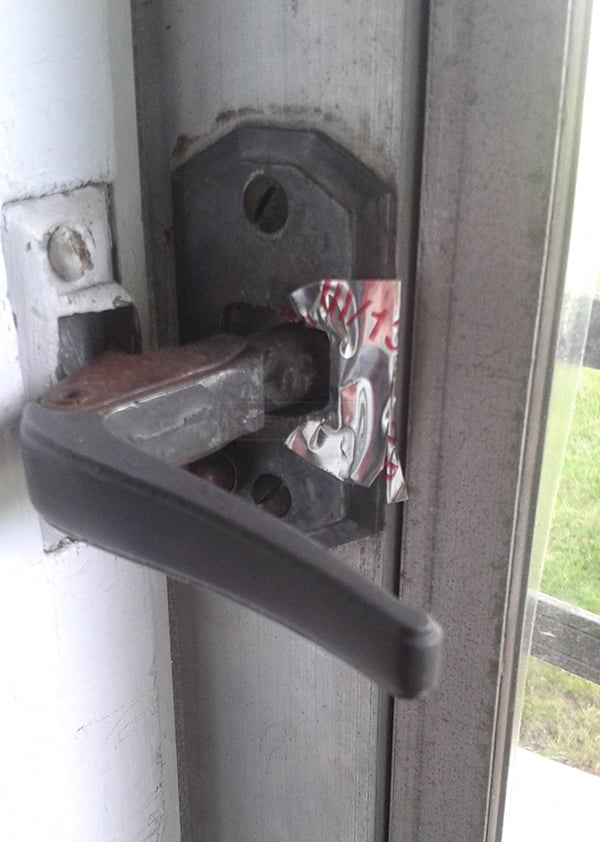 User submitted a photo of storm door hardware.