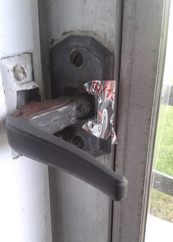 User submitted a photo of storm door hardware.