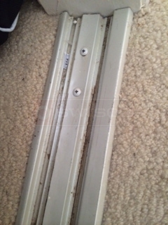 User submitted a photo of mirror closet door track.