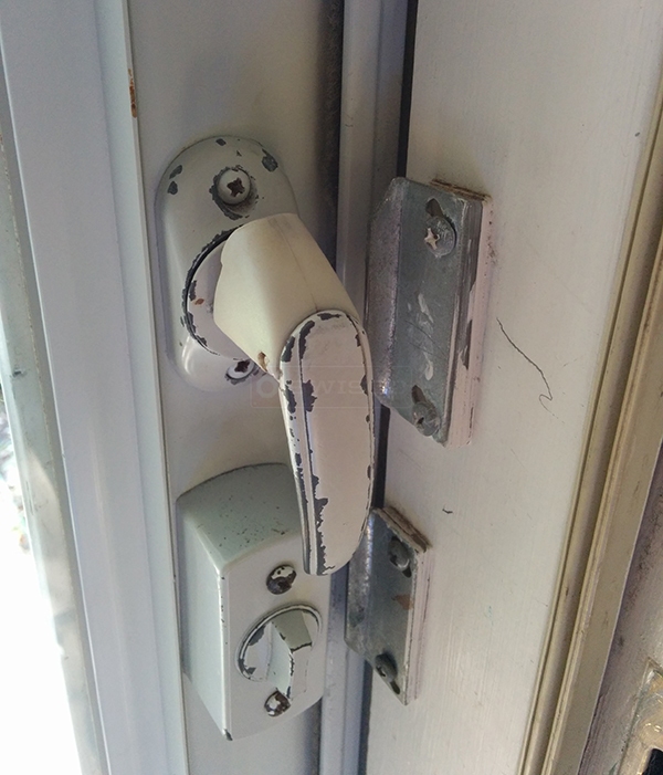 User submitted a photo of storm door hardware.