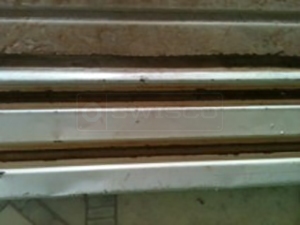 User submitted a photo of a mirror closet door track.