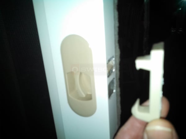 User submitted a photo of screen door hardware.