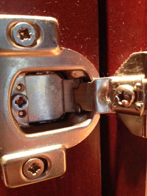 User submitted a photo of a cabinet hinge.