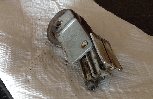 User submitted photos of a patio door roller.