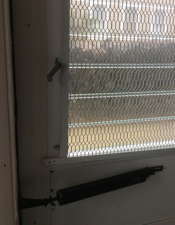 User submitted a photo of storm door hardware.