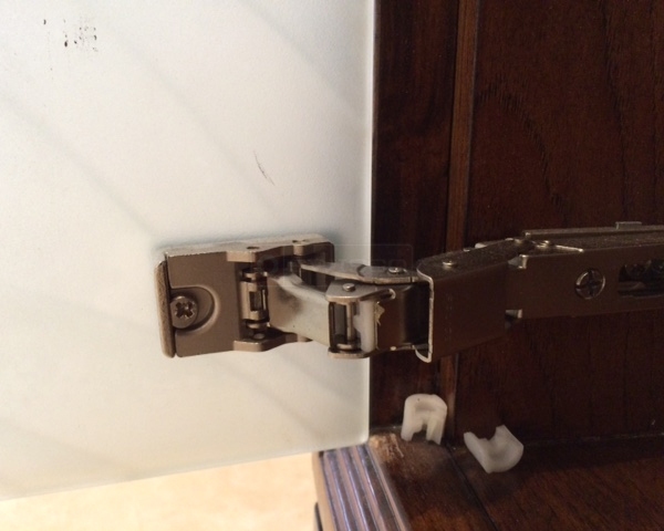 User submitted a photo of a cabinet hinge.