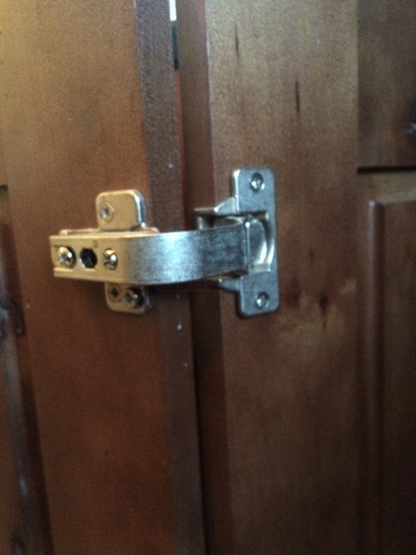 User submitted a photo of a cabinet hinge.