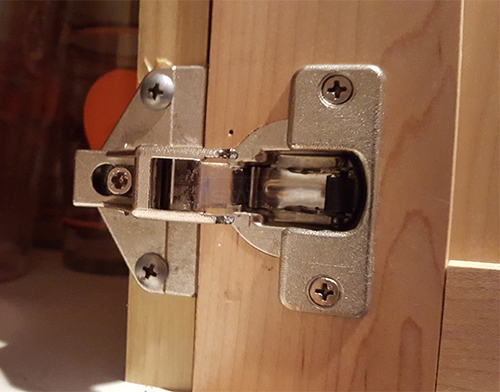 User submitted a photo of a cabinet hinge.