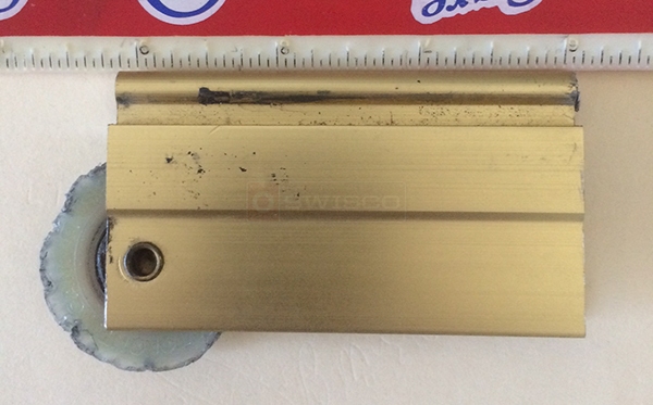 User submitted a photo of a closet door roller.