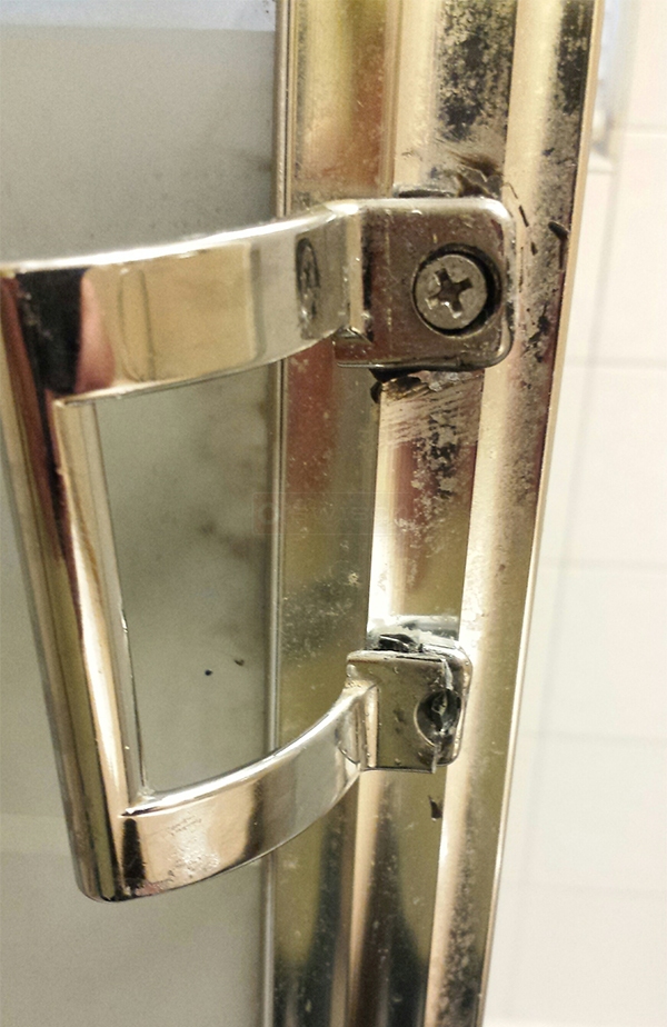 User submitted photos of shower door hardware.