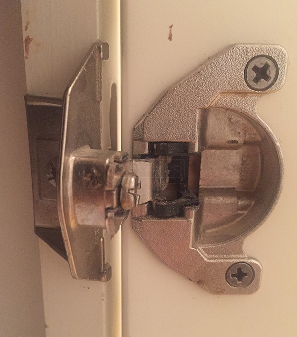 User submitted a photo of a cabinet hinge.