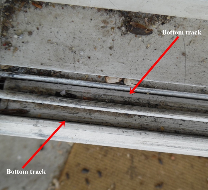 Bottom sliding screen door track
