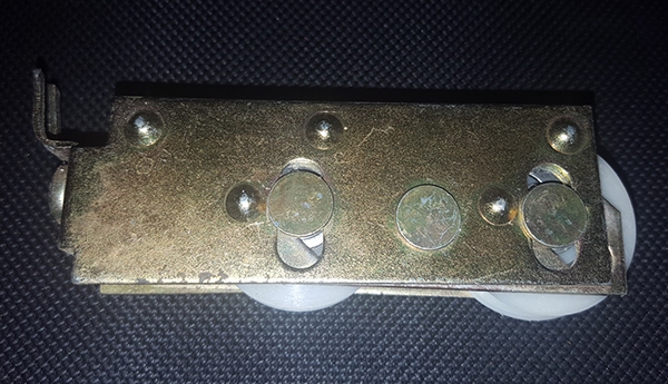 User submitted photos of a patio door roller.