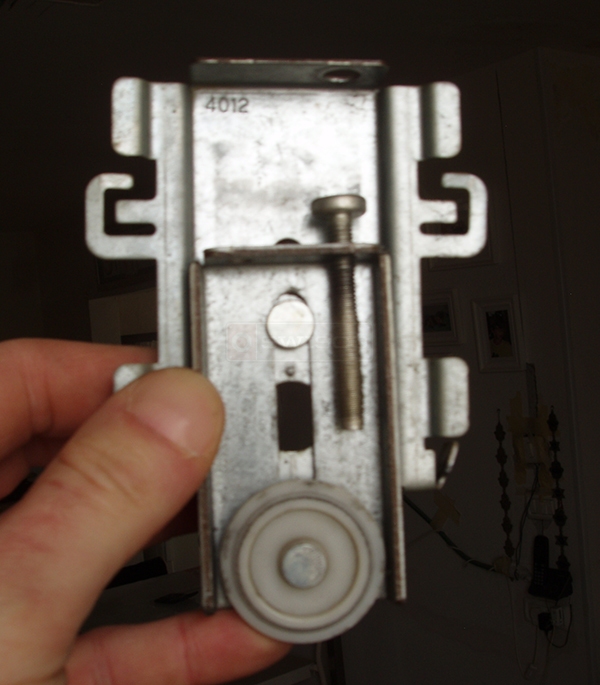 User submitted photos of a closet door roller.