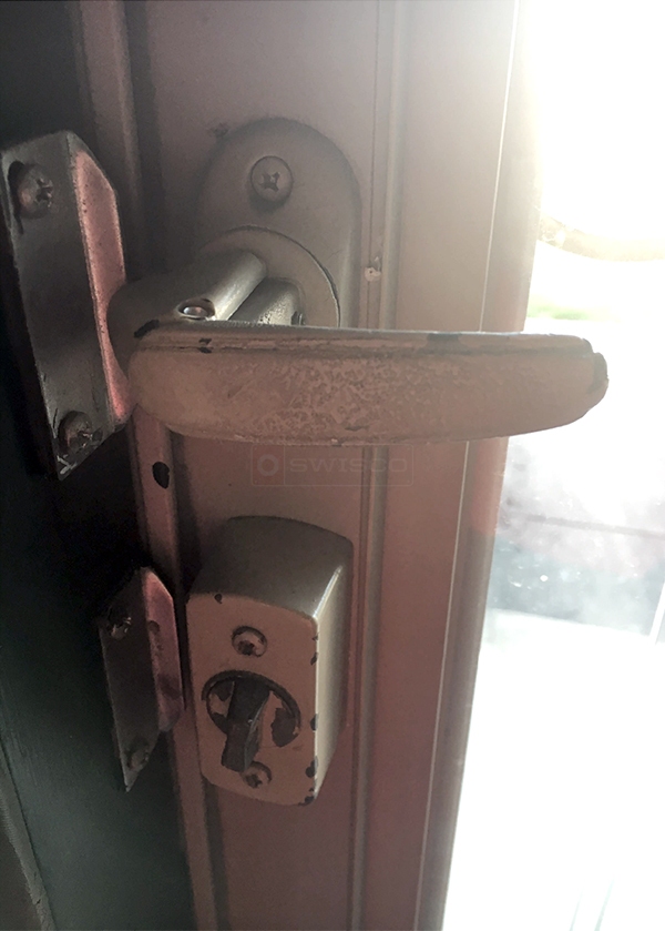 User submitted photos of storm door hardware.