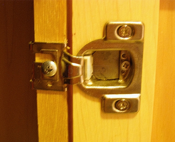 User submitted photos of a cabinet hinge.