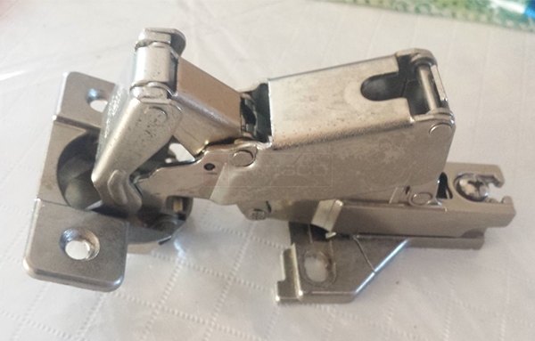 User submitted photos of a cabinet hinge.