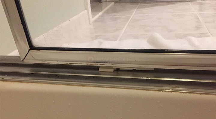 User submitted photos of shower door hardware.
