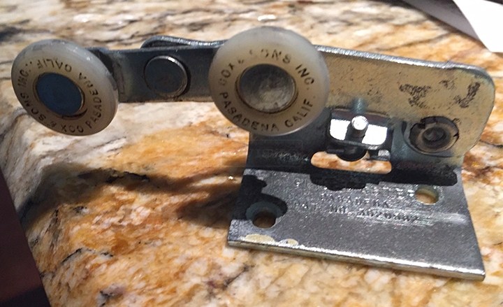 User submitted photos of a pocket door roller.
