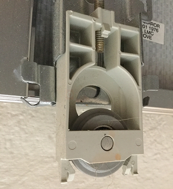 User submitted a photo of a closet door roller.
