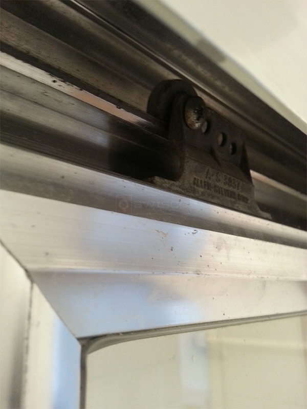 User submitted photos of shower door hardware.
