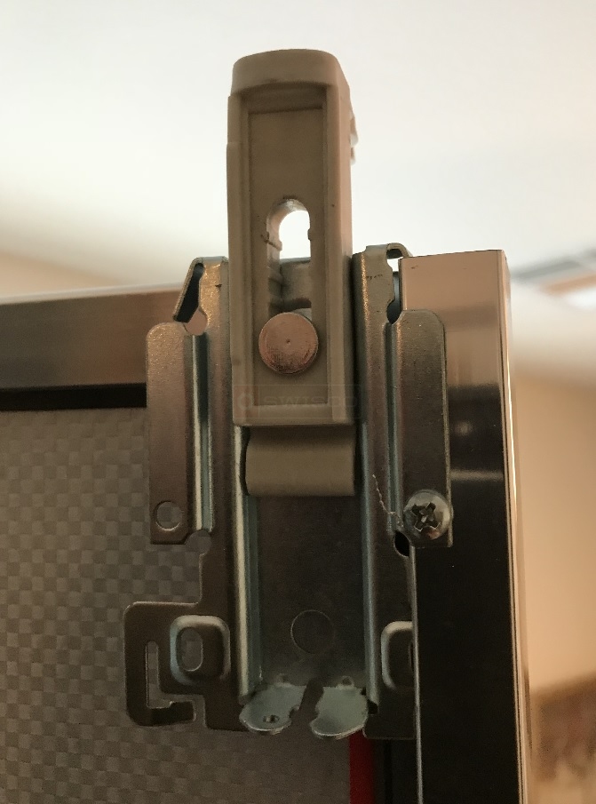 User submitted a photo of closet door hardware.