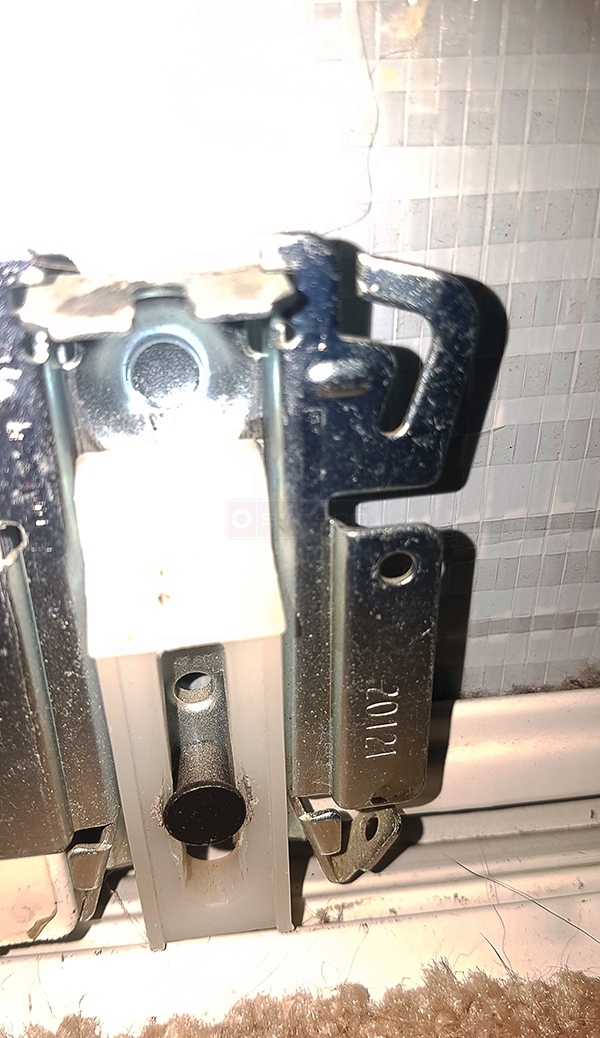 User submitted a photo of closet door hardware.