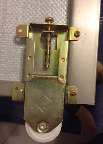 User submitted a photo of a closet door roller.