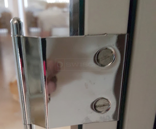 User submitted photos of shower door hardware.