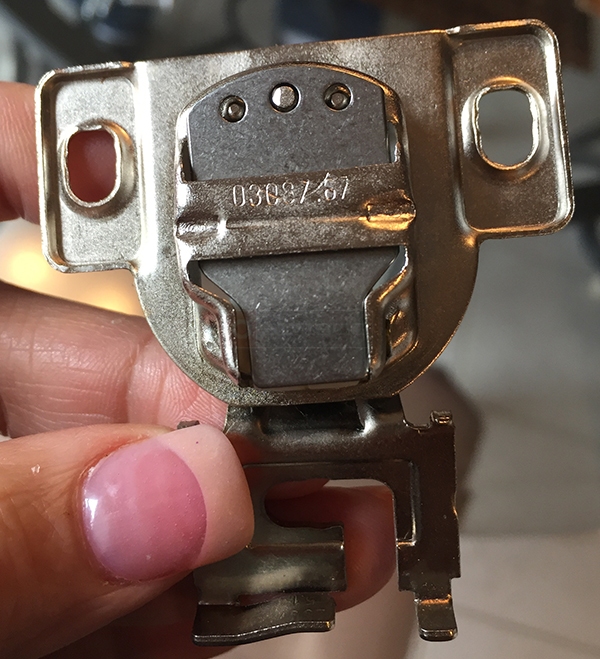 User submitted photos of a cabinet hinge.