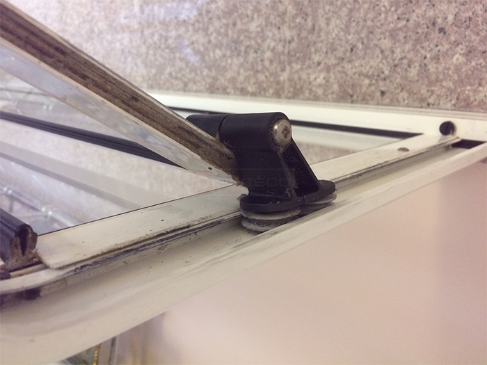 User submitted photos of shower door hardware.