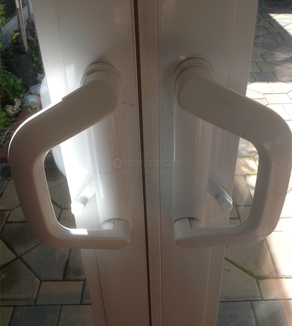 User submitted photos of patio door hardware.