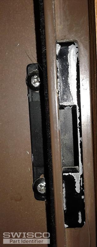 close up lock fixture attached to frame