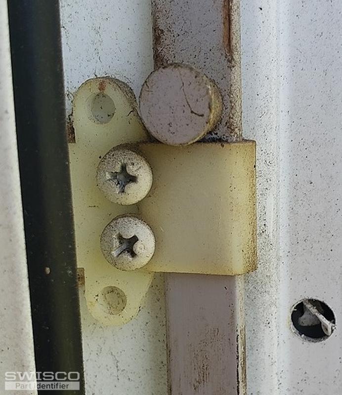 Vinyl clip that guides locking mechanism in casement window