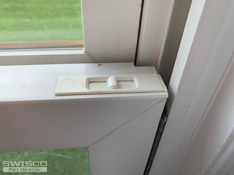 tilt latch for double hung windows