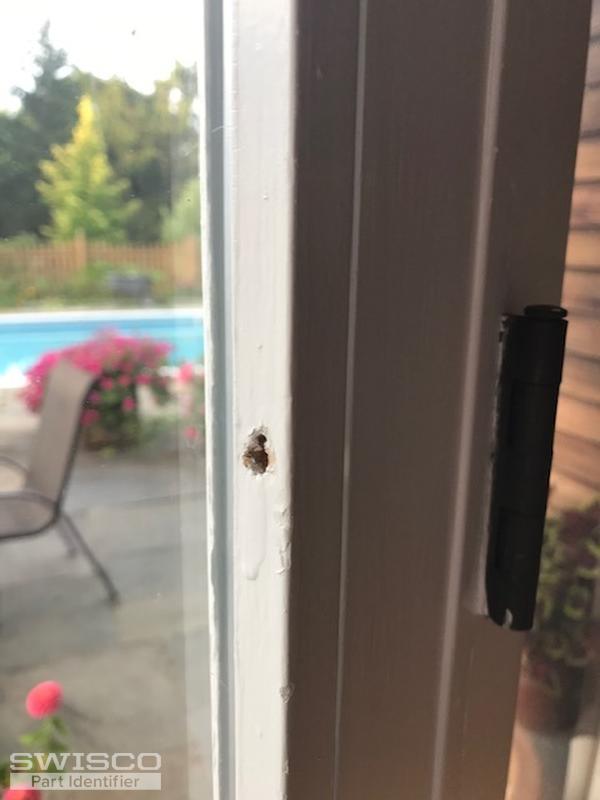 close up of grille push pin hole