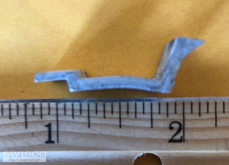 Clips to hold in glass storm door