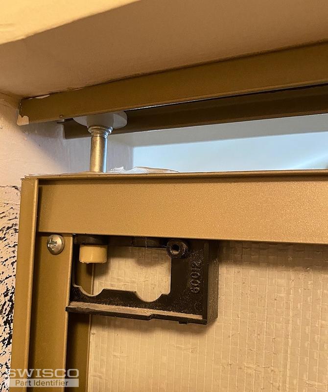 How do I adjust my bifold door to keep the roller coming out