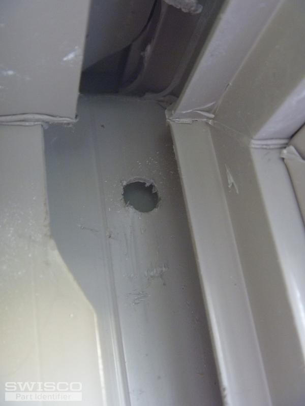 Hook hole in window of balancer, 1 of 2