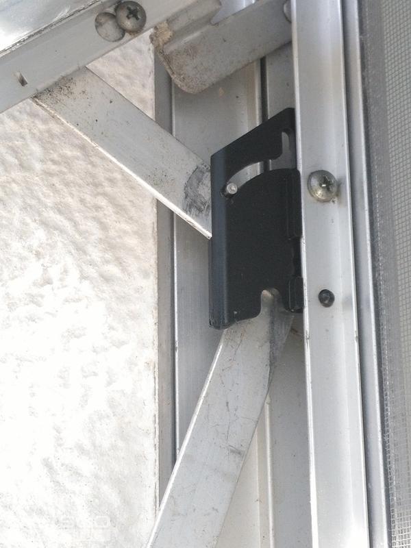Awning window black or white lock, locks window in closed position
