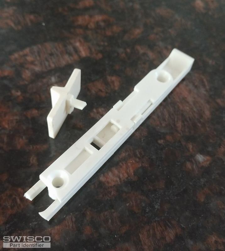 Double hung window tilt latches