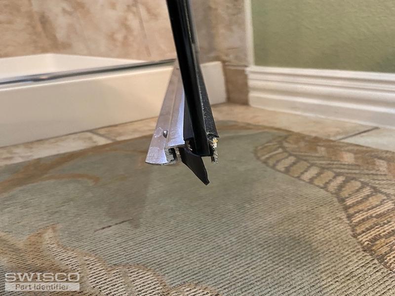 Two piece shower door sweep with drip rail