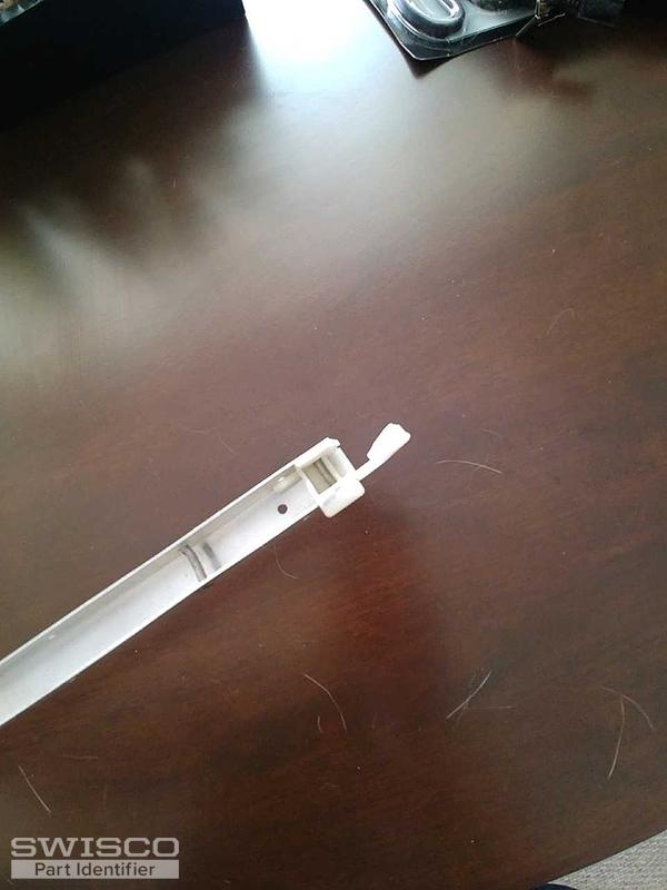 Broken end part that attaches to black plastic pie
