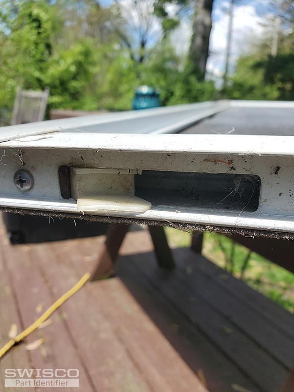 Screen door rollers - bottom left