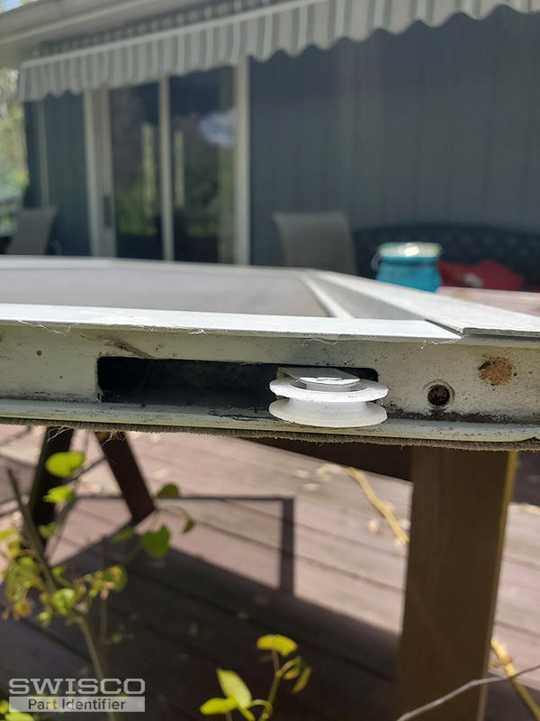 Screen door rollers - top - still works