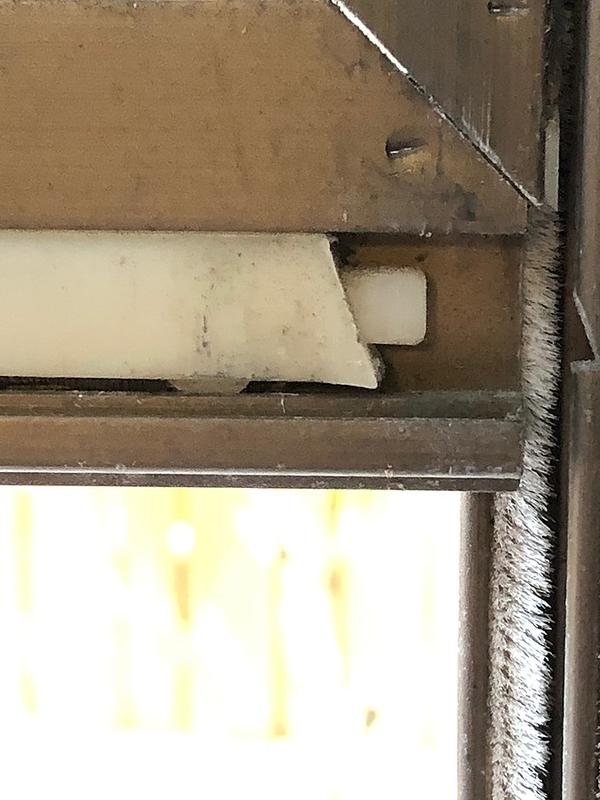 Corner latch in place with tab